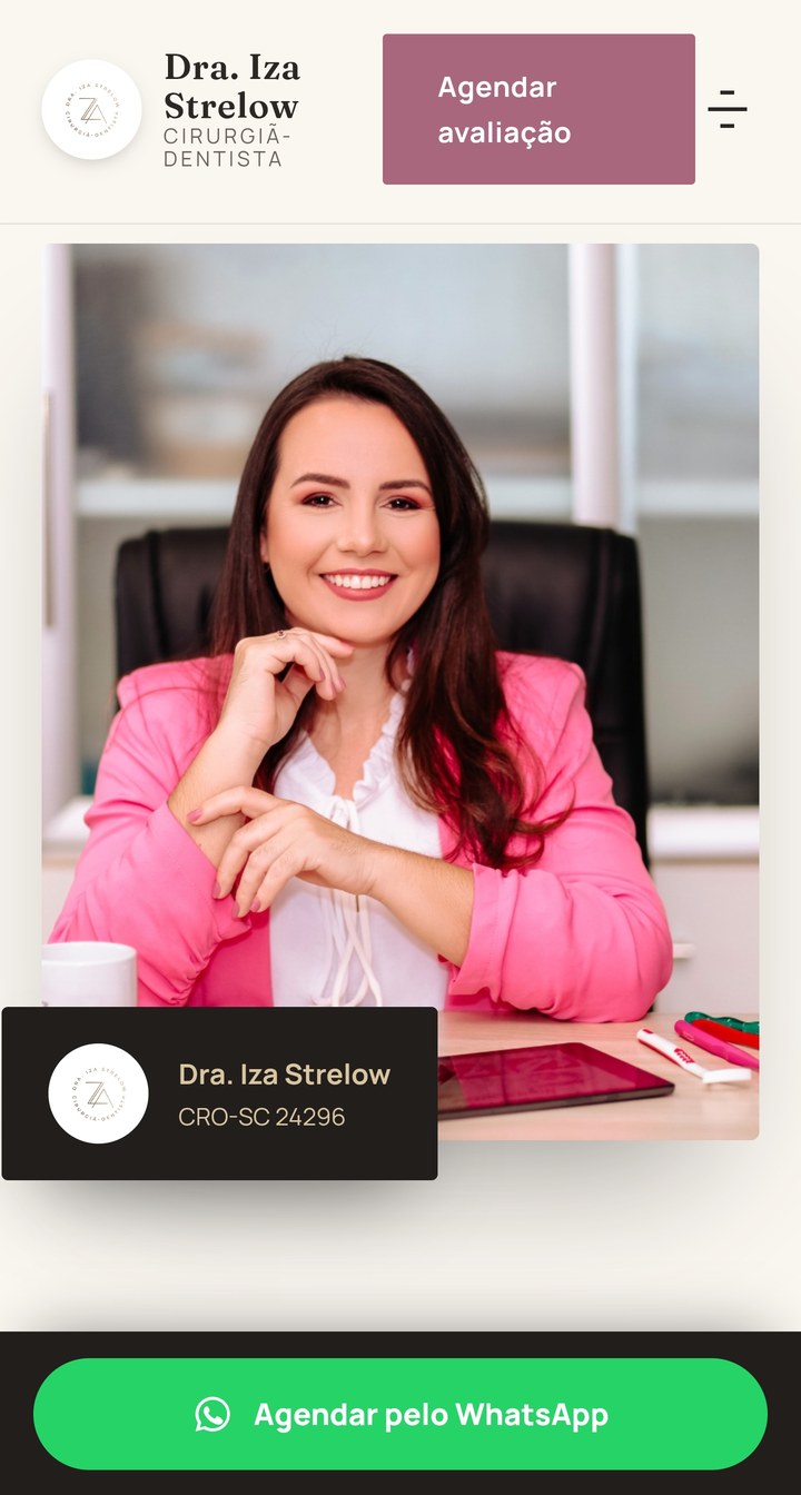 Site da Dra. Iza no celular: abertura com a foto da doutora